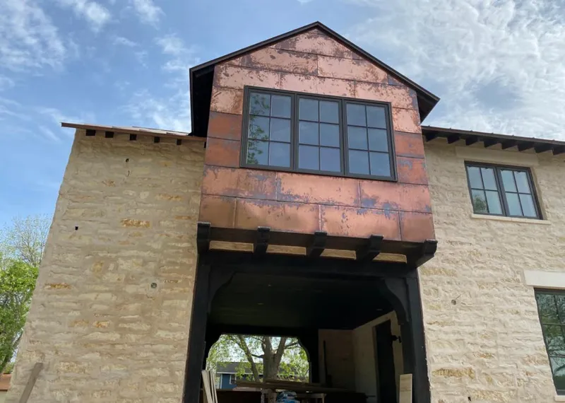 Copper metal panel facade on a stone building for Metal Roof Coating in Fairland