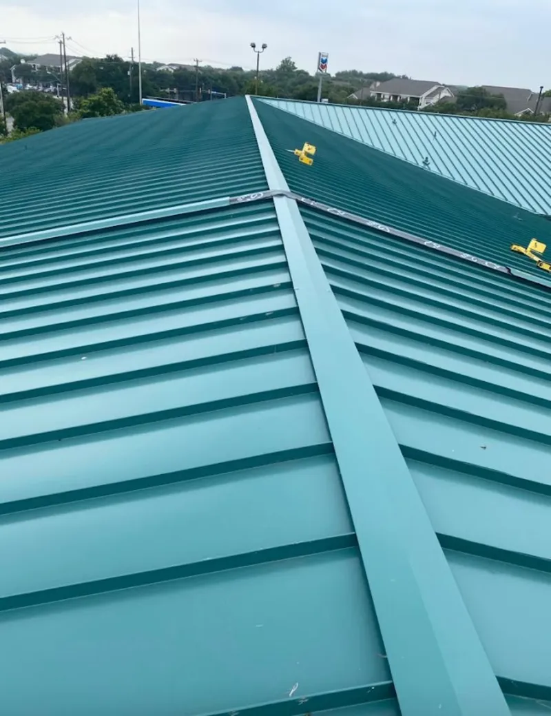 Green commercial metal roof ridge and valley for Metal Roof Repair in Fairland